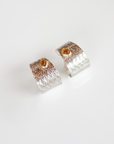 Reptilia silver earring with citrine, side view of the cuff-like shape.