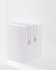 Grace scapular necklace by Carlota Guardia Jewelry from the Be Grateful collection, designed to support a daily gratitude ritual, crafted in recycled gold with natural gemstone.
