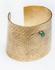 Reptilia Maxima vermeil cuff with green cabochon, angled view.