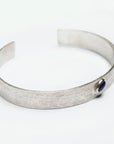 Reptilia Mini silver bracelet with natural gemstone cabochon, front view.