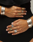 Model wearing the Reptilia Mini silver bracelet with natural gemstone, on-wrist.