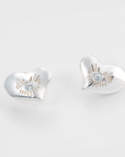 bright heart earrings in sterling silver, with ethical diamonds, detail view. Carlota Guardia Jewelry