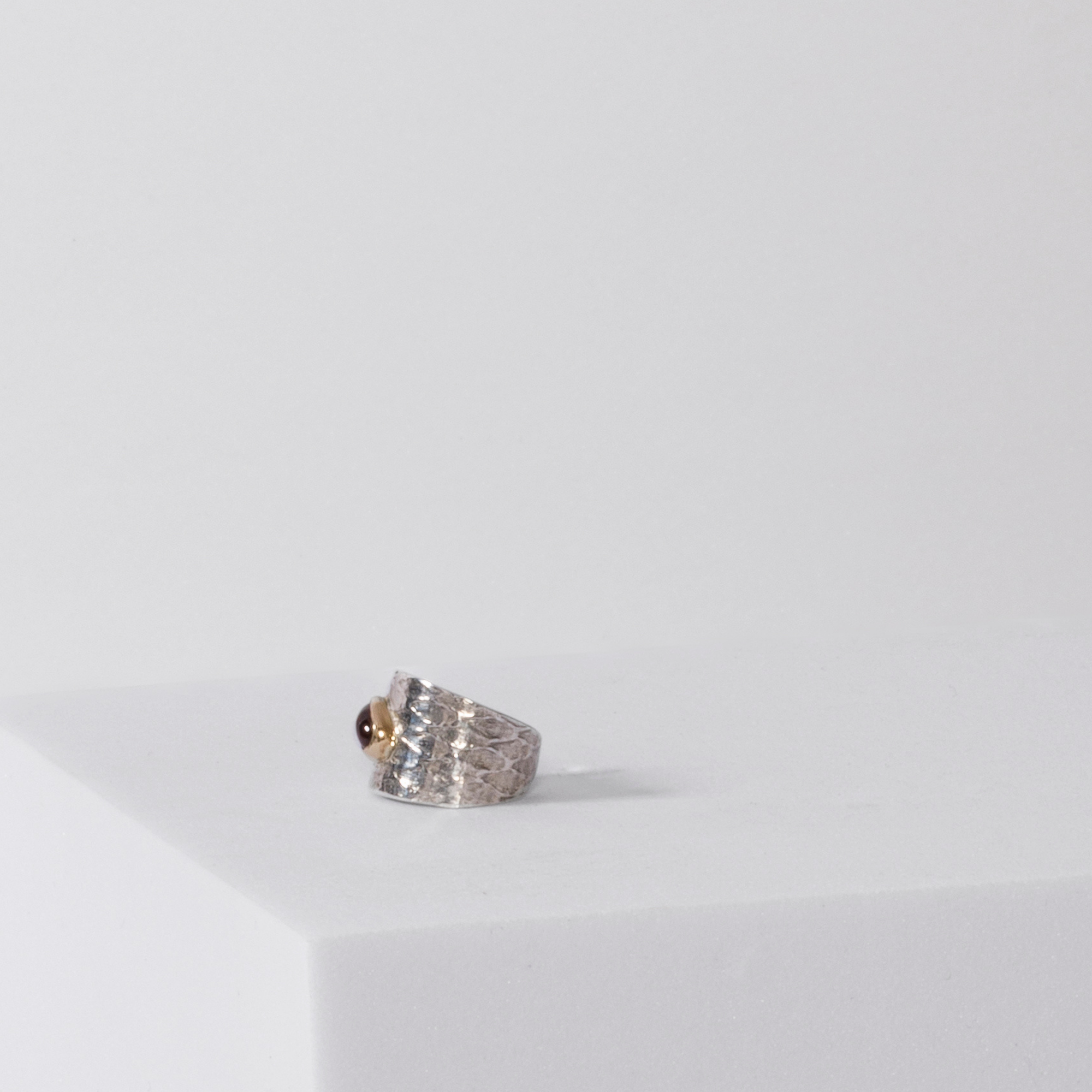 REPTILIA EARCUFF · SILVER AND NATURAL GEMSTONES