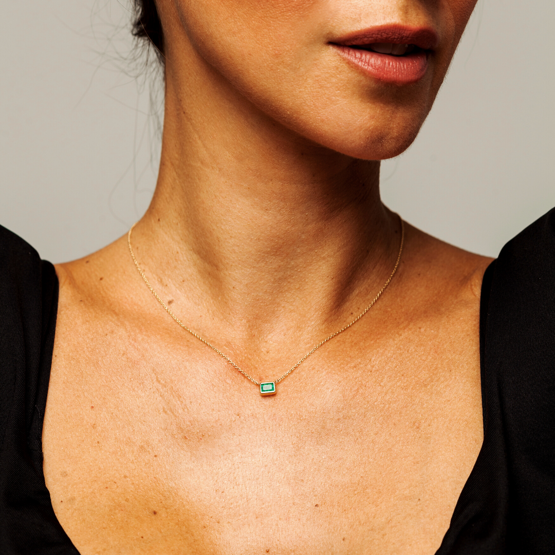 recycled-gold-heritage-pendant-birthstone-on-skin.png