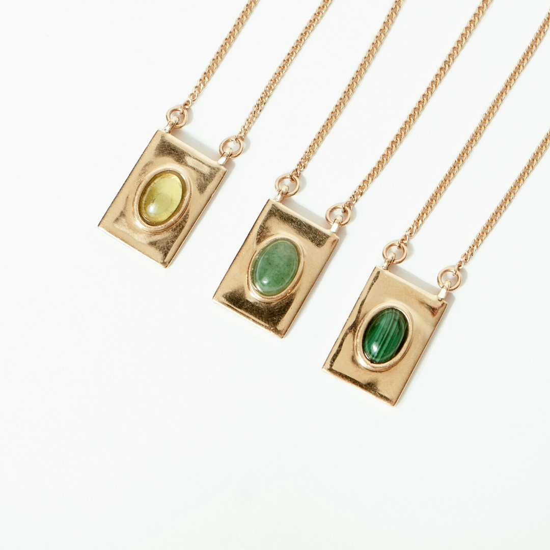 Grace scapular necklace by Carlota Guardia Jewelry from the Be Grateful collection, designed to support a daily gratitude ritual, crafted in recycled gold with peridot, aventurine or malachite gemstone.